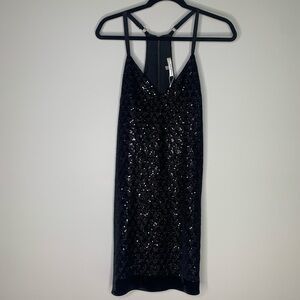Black cocktail dress, NWT!! Size X-SMALL sequin/velvet/zip detail racer back